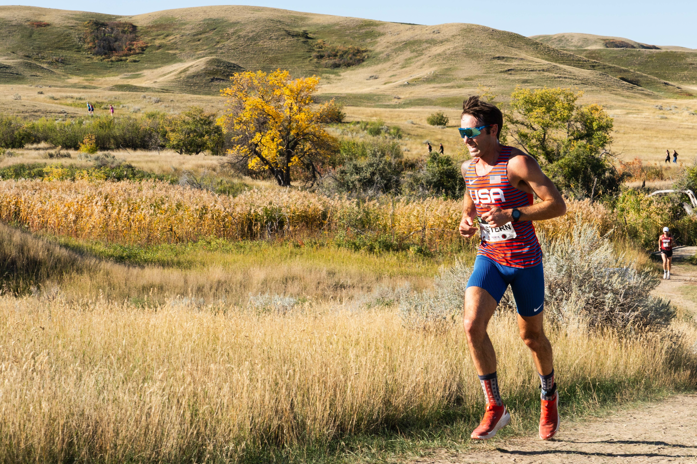 Jeff Stern running in Team USA bib. 